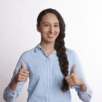 person, thumbs up, smiling